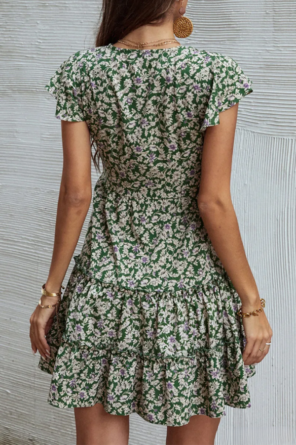 Laura® | V-neck and ruffle dress with elegant floral bow